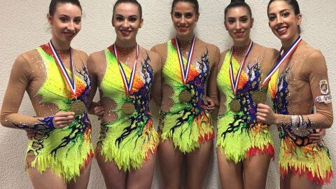 El equipo femenino de gimnasia rítmica El equipo femenino de gimnasia rítmica